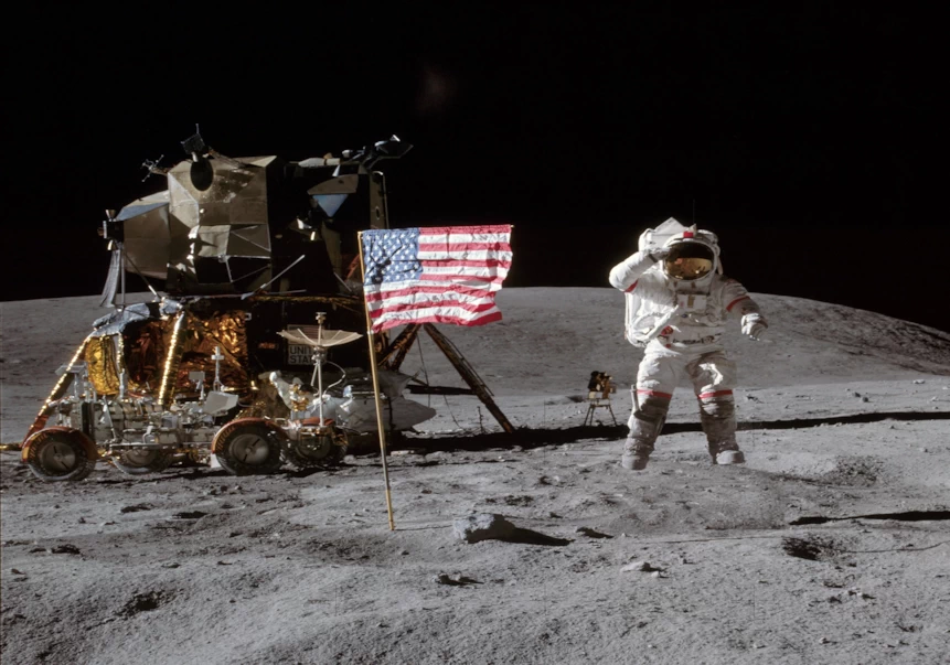 John Young, on the Moon, jumping and saluting the flag